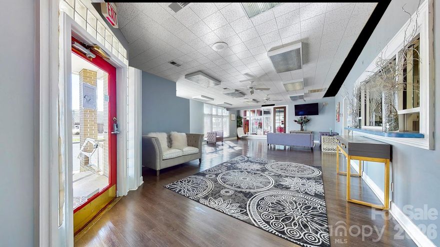 This all-brick, freestanding commercial building offers 7,246± SF of professional office space in one of Rock Hill’s most established and high-traffic corridors. Located just off Herlong Avenue—minutes from Piedmont Medical Center and under 10 minutes to I-77—the property sits on a 0.71± acre corner lot with 350± feet of frontage along Ebenezer Road and Glenwood Drive. A two-entry lot provides 42 parking spaces.

Formerly a medical office, the building now operates as a multi-tenant space serving beauty, wellness, and medical providers. The interior includes 26 private rooms, a large lobby and waiting area, six restrooms, a break room, and ample storage. Zoned NO (Neighborhood Office), the layout supports healthcare, salon suites, or general office use.

This well-maintained, income-producing property offers a strong opportunity for investors seeking a stable, flexible asset in a prime location. Surrounded by service-based businesses, it offers excellent visibility and access.