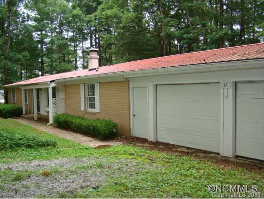 One level living in convenient location to Fletcher and Hendersonville, less than 3 miles to I-26. Tucked away off main road of Rugby Meadows subdivision.  Deck and privacy.  3 BR plus bonus room with closet; 3 full baths; open Kitchen-LR area; large double garage with workshop area; Needs cleanup and updates.   Seller says MOVE IT! Take a look and bring an offer! GREAT opportunity!