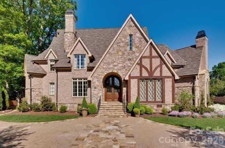 Rare opportunity for custom home located one of Foxcroft’s premier street.  New interior paint and carpet. Primary on main. Large kitchen with 2 islands, separate pantry, and wine room. Hardwood floors, high ceilings, large formal areas, and custom millwork throughout. Features include 3 floors, all with elevator access complete with all ensuite bedrooms, cedar closet, abundant storage, bonus room and gym. 4 car garage, pool, sport court, covered outdoor living with fireplace & grilling area. Professionally landscape yard with mature trees offers privacy and gated entry to circular drive. Easy access to neighborhood swim & tennis club (membership required) and walking trails.