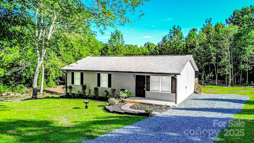Seller offering up to $5,000 in closing costs. Welcome to 204 Caldwell Street, a beautifully updated 3-bedroom, 2-bath home on a spacious 1.10-acre lot. This 1,176 sq ft property combines modern upgrades with close proximity to Downtown Forest City.

Inside, enjoy new flooring throughout, fresh interior and exterior paint, and an open-concept kitchen featuring a brand-new electric range, microwave, refrigerator, washer, and dryer. The home also has all-new plumbing and electrical systems, a new water heater, and stylish finishes that make it move-in ready.

Step outside to relax on your oversized 16x16 back deck, perfect for entertaining, along with a separate floating deck for additional leisure space. The yard has been thoughtfully cleared, with 17 trees removed, creating a more open and usable outdoor area that includes a small trail in the woods. New gravel was laid on the driveway, now bordered by a privacy fence for added seclusion and curb appeal.
 Real estate agent owns