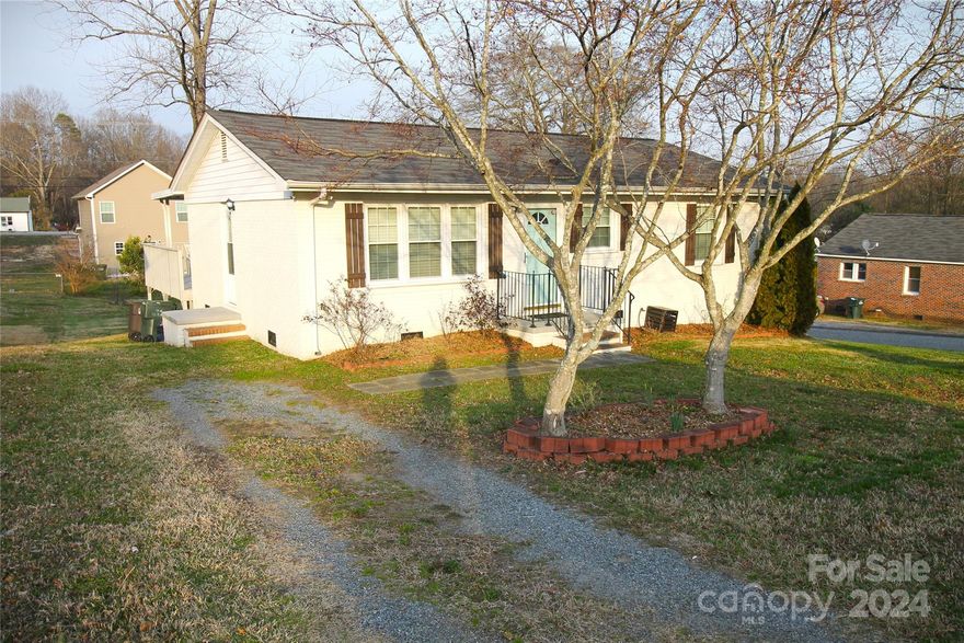 .Charming 3 bedroom, 1 bath brick ranch home. with stylish wood shutters, Beautiful Hardwood floors and luxury vinyl flooring in kitchen and bath. Kitchen is styled with shelving, Subway tile and Stainless Steel appliances. Newer HVAC installed May 2022, new PEX Plumbing 2020 Covered deck 16 x 24 perfect for relaxing and entertaining guest. Nice back yard with 12x16 storage shed. Large Corner lot. You must see this one.