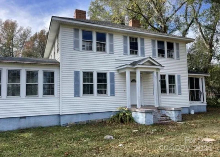 Gorgeous 5 bedroom 2 bath home in the heart of Rockingham. Take a look at its beautiful original character waiting to be restored and lived in. This property features a main level primary bedroom with full bath, sun room with wrap around windows, formal dining room, large kitchen, cathedral ceilings throughout, two original fireplaces, 4 guest rooms upstairs. original hardwoods, and tons of potential. New roof in 2021