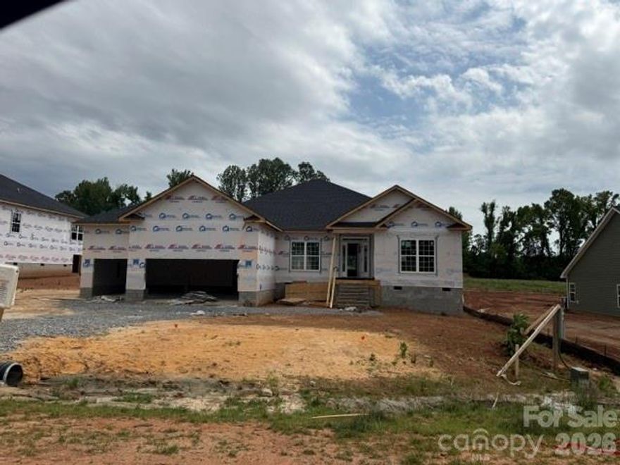 Only $1000 down to write contract! This brand new construction home is situated on .98 acres in a peaceful setting in the new subdivision McNeely Farms in Mt Ulla, NC! Just minutes from downtown Mooresville and shopping, restaurants and interstates 77 and 85.  This 2906 sf  one level ranch has 4 bedrooms and 3 baths, the split bedroom plan is spacious and open with an incredible layout, great for entertaining.  This home features 9' ceilings throughout, a huge eat in kitchen with large kitchen island overlooks the family room and also has a separate formal dining room.Included in this home are quartz countertops, tiled kitchen backsplash, gourmet gallery stainless steel kitchen appliances, laminate wood flooring throughout the main areas and primary bathroom with 5' tiled shower, built in drop zone. The  16 X 14 covered deck overlooks a level large and tranquil backyard. Exterior highlights include durable Hardie board siding, an upgraded stone package, and the added benefit of no HOA fees. Closing cost paid (except prepaids and points) with use of preferred lender.  Flex cash available to lower interest rate!!
