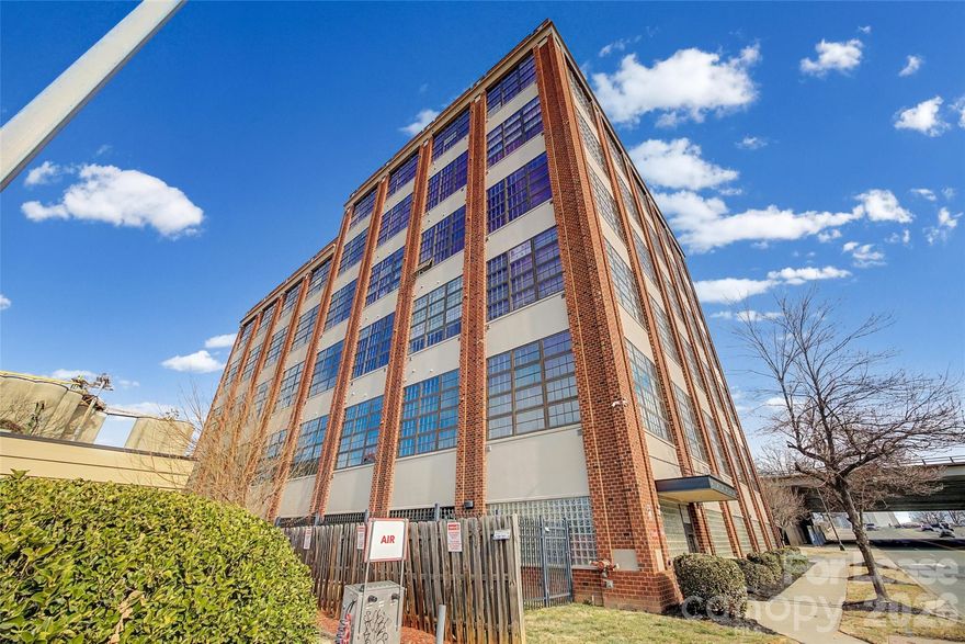 Stylish condo with stunning city views and dramatic floor-to-ceiling windows. Features a loft-style primary suite on the top floor with ensuite bath including shower and tub. Main level offers a second bedroom, full bath with laundry, and open-concept kitchen and living area. Enjoy premium rooftop access with outdoor entertaining space, fireplaces, equipped kitchen, grills, and views of local fireworks. Secure building with integrated technology, secure lot and garage access. 1 assigned parking space + 1 guest pass included.