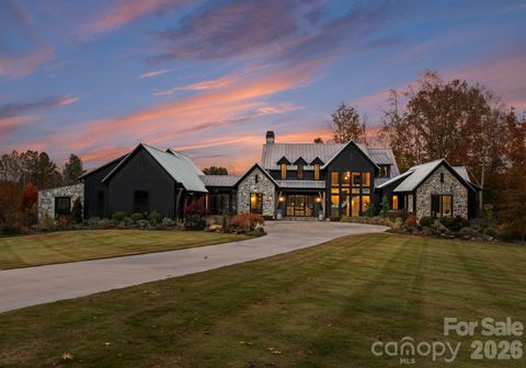 Photo of 3979 NC HWY 73 Highway, Iron Station, NC 28080 (MLS # 4361065)