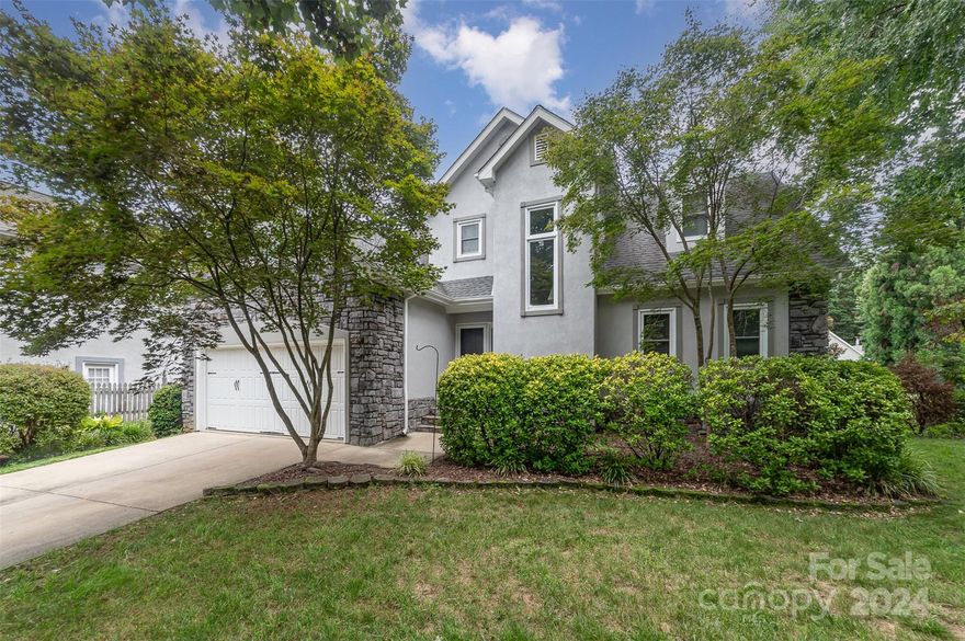 Beautifully updated home in Blue Stone Harbor, a waterfront community that includes a deeded boat slip #130 (the last deep water boat slip available in the community). Updated kitchen includes stainless appliances, cabinets, coffee bar, quartz countertops, wine bar, backsplash, and LVP flooring in step down living room. The main level boasts a modern kitchen, living room, dining area, gas fireplace, half bath, laundry room, primary suite with a spacious walk-in closet, dual vanities, soaking tub, and walk-in shower. Upstairs, you will be greeted with a large loft/bonus room, two large bedrooms, full bathroom, and attic storage. Step outside where you will be greeted with a private backyard and a spacious patio, ideal for outdoor dining and relaxation. Enjoy proximity to amenities, local dining, shopping, highly rated schools, easy access to highway 77, and walking distance to your deeded boat slip. Washer/Dryer/Refrigerator are included. Schedule your private showing today!