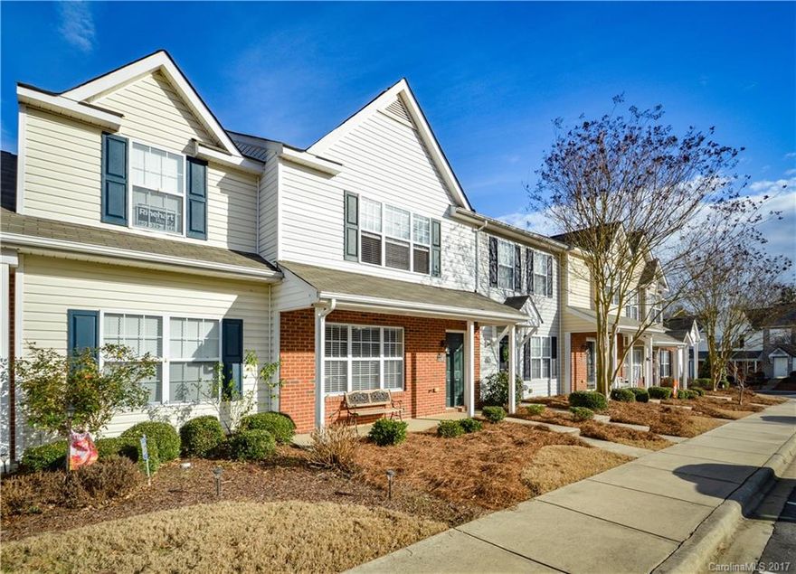 Secluded, move-in ready townhome only minutes to I-77, shopping and dining!  New carpet and fresh paint throughout, two spacious master suites, family room with gas logs, first floor laundry and powder room along with a private deck that overlooks the wooded common area. Make this your home today!