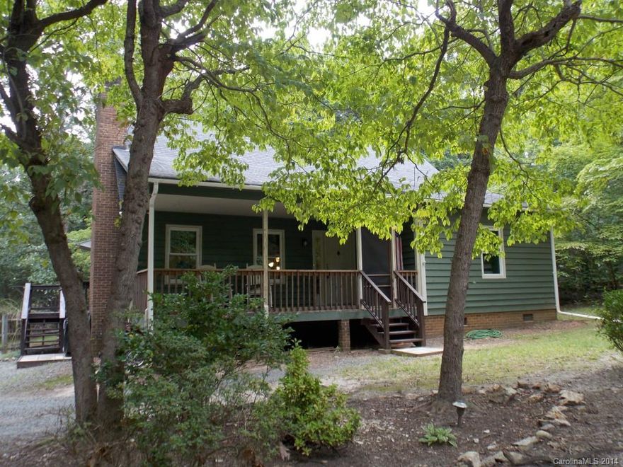 Charming 2 br/1.5 bath home in Waxhaw on 1+ acre lot.  Wooded and private with fenced in back yard.  Kitchen and bath's  remodeled in 06', windows replaced in 10', floor warmer in bathroom, home theater w/10' screen and video projector, 12x12 shop.  Perfect for first time home buyers or rental investment.  USDA eligible. NO HOA!