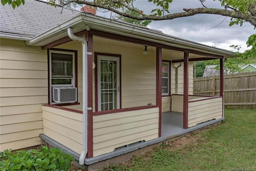 Adorable & Affordable...Completely RENOVATED & MOVE IN READY South Asheville Bungalow!!!  You will fall in LOVE with the CUSTOM tile work in the kitchen, living room & bath! EFFICIENT wood burning stove in the living room and beautiful like new bamboo flooring!  Easy to clean Newer windows! Fully insulated walls, floors & attic! Relax on the covered front porch or eat outside on the side deck off the kitchen! Level yard for a garden & gardener's outbuilding.  All appliances convey!