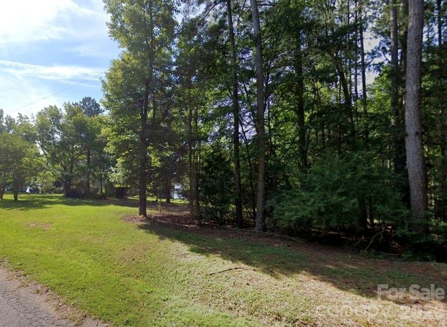 Waterfront opportunity off of the beautiful Fishing Creek Lake. Turn this 1.08 acre lot into your dream home. For dock questions, please refer to the Catawba Wateree Waste Management Group.