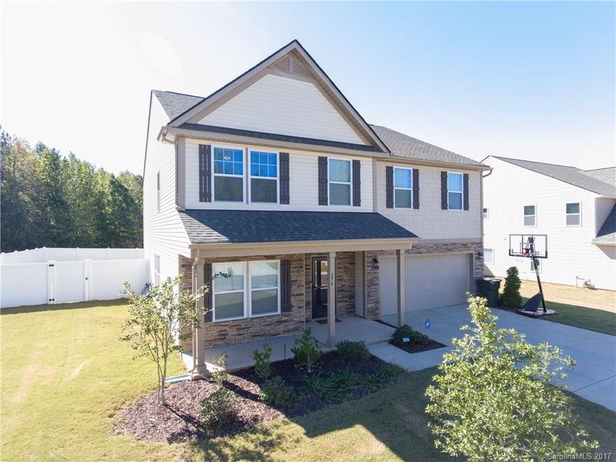 Welcome to this beautiful 2 story home on a corner lot in the Summerwoods subdivision. This home features brilliant hardwood floors, porcelain tile, built-ins in both the great room and rec room, and surround sound. The kitchen has beautiful granite countertops, an island, and a pantry. Master bedroom features tray ceilings, while master bath has double sinks, separate shower, and granite countertops. This beautiful home with privacy fencing will not last long, come take a look!