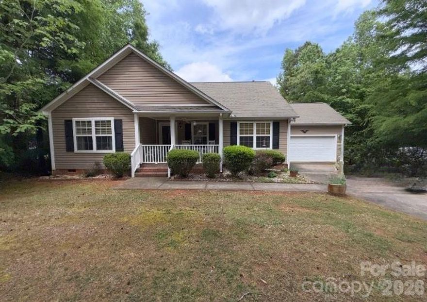 Got your investor hat on? This one's worth a look. Tucked back in the trees on George Dunn Road, this 2006-built ranch has great bones, a smart layout, and some serious upside for the right buyer willing to put in a little work.
The covered front porch, mature wooded lot, and manicured shrubs give it fantastic curb appeal — and the no-HOA situation means you've got full freedom to make it your own. Step inside and you're immediately greeted by soaring cathedral ceilings and an open floor plan that makes the space feel larger than the square footage suggests. The plant shelves add a nice architectural touch that gives the home real character you just don't see in new construction anymore.
At 1,418 square feet the layout is smart — two spare bedrooms with a dedicated office area tucked between them, perfect for working from home or a homework nook. The primary suite is the star of the show with an updated bathroom featuring a walk-in shower that's genuinely move-in worthy. Two full baths total, plus an attached two-car garage. Gutter Guard gutters.
Out back you've got a 16x32 above ground aluminum Kayak pool — perfect for hot South Carolina summers. City water keeps things convenient and the private septic means no sewer bill.
Full disclosure — the home has a strong cigarette odor that will need to be addressed. Think fresh paint, new flooring, ozone treatment, and some elbow grease. For an investor or handy buyer, that's an opportunity to build instant equity in a market where updated homes are selling fast.
Just minutes from I-77 with easy access to Rock Hill, York County, and a quick shot up to Charlotte. The neighborhood is quiet, the setting is beautiful, and the bones of this home are genuinely solid.
Priced to reflect the condition. Come with vision and leave with a deal.