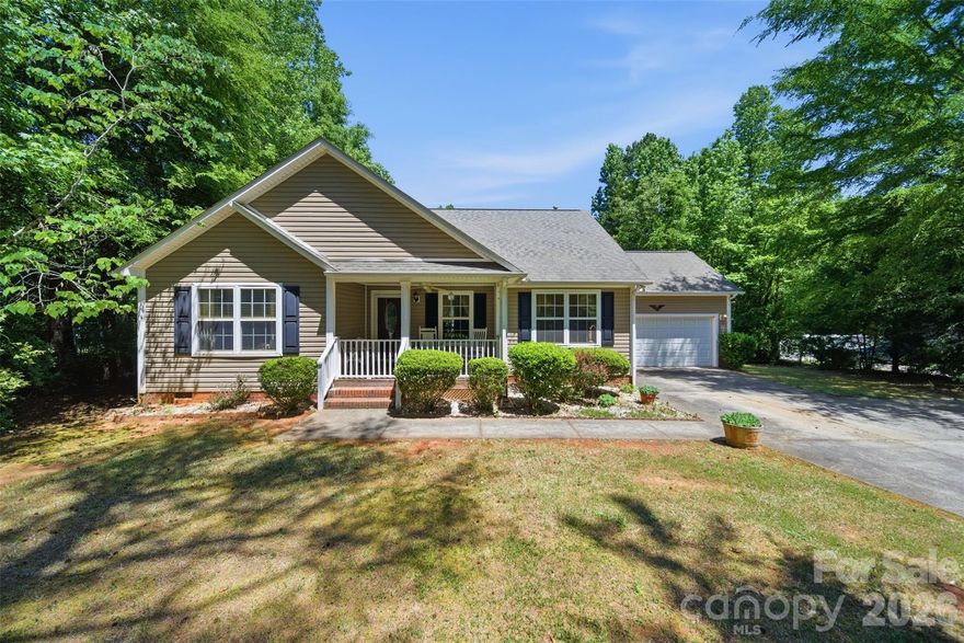 Got your investor hat on? This one's worth a look. Tucked back in the trees on George Dunn Road, this 2006-built ranch has great bones, a smart layout, and some serious upside for the right buyer willing to put in a little work.
The covered front porch, mature wooded lot, and manicured shrubs give it fantastic curb appeal — and the no-HOA situation means you've got full freedom to make it your own. Step inside and you're immediately greeted by soaring cathedral ceilings and an open floor plan that makes the space feel larger than the square footage suggests. The plant shelves add a nice architectural touch that gives the home real character you just don't see in new construction anymore.
At 1,418 square feet the layout is smart — two spare bedrooms with a dedicated office area tucked between them, perfect for working from home or a homework nook. The primary suite is the star of the show with an updated bathroom featuring a walk-in shower that's genuinely move-in worthy. Two full baths total, plus an attached two-car garage. Gutter Guard gutters.
Out back you've got a 16x32 above ground aluminum Kayak pool — perfect for hot South Carolina summers. City water keeps things convenient and the private septic means no sewer bill.
Full disclosure — the home has a strong cigarette odor that will need to be addressed. Think fresh paint, new flooring, ozone treatment, and some elbow grease. For an investor or handy buyer, that's an opportunity to build instant equity in a market where updated homes are selling fast.
Just minutes from I-77 with easy access to Rock Hill, York County, and a quick shot up to Charlotte. The neighborhood is quiet, the setting is beautiful, and the bones of this home are genuinely solid.
Priced to reflect the condition. Come with vision and leave with a deal.