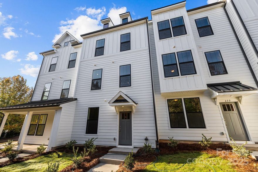 Move-in Ready! New home construction in sought out Baxter Village in Ft Mill, SC.  These new contemporary designed townhomes offer gourmet kitchens with extended island and stainless steel appliances, perfect for the home chef.  Featuring dual sliding glass doors that open onto sitting deck. The open floor plan, seamlessly blends the kitchen and living area perfect for entertaining family and friends.  Retreat to your luxurious primary suite, a haven of relaxation and style.  Enjoy ample space, natural light, and spa-like bathroom with double vanity and tiled shower with seat. Two additional bedrooms on 3rd floor and laundry, with an additional guest bedroom on the first floor with full bath. Attached 2 car garage for secure parking and additional storage space including EV outlet.