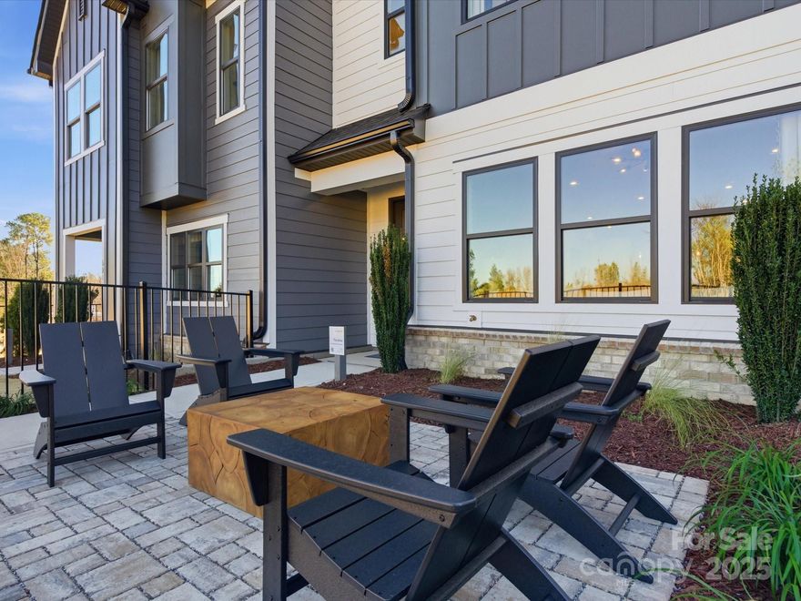 Facing tree-lined views and close to the community walking trail, this Anne plan is a prime opportunity to own in the new Grahym at Southbridge community. With 3 bedrooms and 2.5 baths, a loft space, fully fenced in front yard, and 2-bay rear load garage, this home has it all. Designer selected finishes give this space a modern and elegant flare. The kitchen holds frost painted cabinetry and modern brick lay backsplash while the primary en suite bath boasts a marble-look floor tile and glass framed walk-in shower.

Fully fenced in front yard facing tree-lined views with covered front porch and entry.
Open rail and wood stairs leading to second floor providing durability and modern design.
Spacious primary suite with en suite spa-inspired bath and large walk-in closet.
Located in top-rated schools with convenience to local shops and restaurants, I-77, and CLT airport.