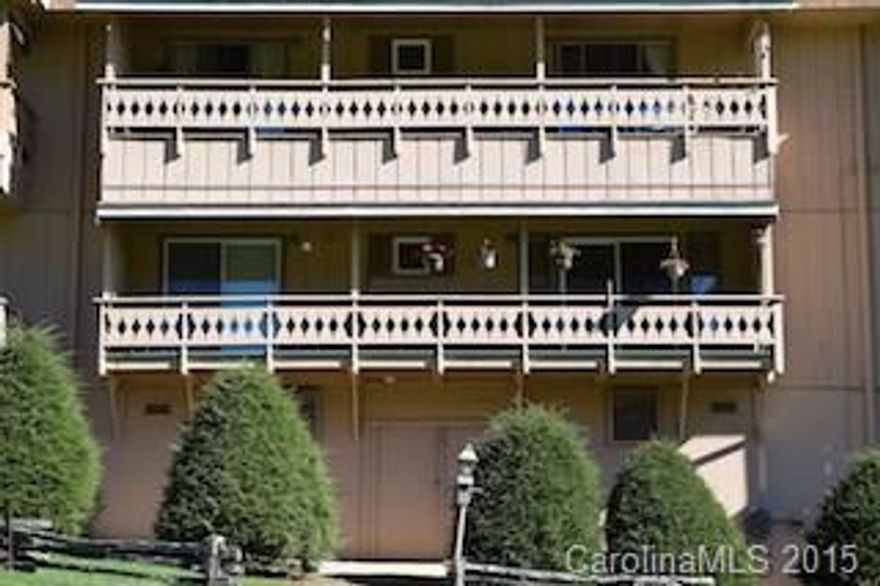 Incredible & completely upgraded 1st floor Condo at Grassy Creek Golf Course! Located right off the fairway! Enjoy the mountains in luxury with a beautiful view of the manicured golf course, the mountains on one side and a pond with a fountain on the other. Hardwood floors throughout. Amazing kitchen has stainless steel appliances that will thrill any chef!  Tiled baths with walk in showers. Stacked washer/dryer. Enclosed golf cart parking & extra storage. All furnishings included!