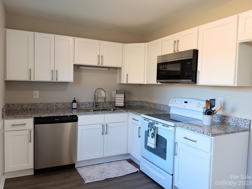 Extensive Rehab Includes NEW: White Shaker Kitchen Cabinets with Soft Close Feature, SS Dishwasher, SS Microwave, SS 9" Undermount Sink, Granite Countertops, Cabinet Pulls, Luxury Vinyl Plank Flooring, Carpet & Pad, Vanity, Toilet, Faucets, Mirror, Shower Head, Lighting, Door Knobs, Hinges, Hardware, Supply Lines, etc. Fresh Paint Inside. Too Much to List. Also: Level Lot. Move In Ready..!! Once Inside, No Steps to Climb. Not much " NEW" Inventory..!! Minutes to Wingate and Monroe. With most everything Brand New this should be somewhat Maintenance Free.