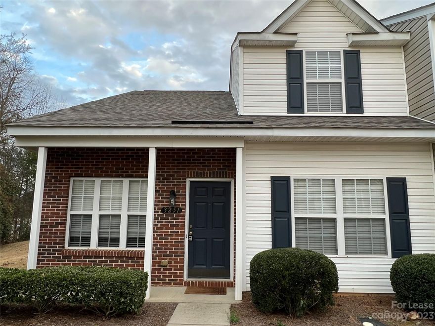 Cute and cozy townhome with a primary bedroom suite on main level, spacious great room, gas log fireplace and a nice size kitchen. Upstairs it offers a second bedroom and a loft which can be use as an office or guest bedroom. It backs up to a private wooded area, close to UNCC, Shops, I-485 and Concord Mills.