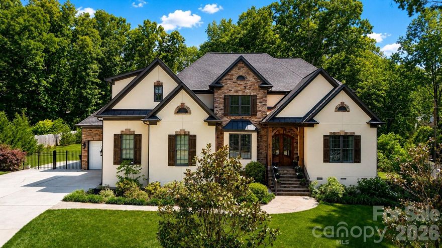 Welcome to this stunning custom built home in the desirable Red Oak Estates community of Mint Hill. Perfectly situated on a spacious 0.68 acre lot, this elegant 5 bedroom, 3.5 bath residence offers privacy, timeless design, and exceptional craftsmanship throughout.

Built in 2006 by Ed Shirley, this home was one of the original custom homes in the neighborhood and was originally listed in the high $800s back in 2007, reflecting the quality, detail, and upscale finishes that still stand out today. One of the few homes in the area with No HOA enjoy full freedom and lower carrying costs without any homeowners association fees or restrictions.

Step inside to an impressive interior featuring hardwood floors throughout the main level, soaring ceilings on both floors, detailed moldings, and a bright, open layout designed for comfortable living and entertaining. The gourmet kitchen is a true centerpiece, offering a large center island, professional-grade appliances, generous pantry storage, and beautiful custom built-ins. The kitchen flows seamlessly into the main living areas, including a spacious great room with a cozy gas log fireplace.

The first-floor primary suite provides a private retreat with a luxurious spa-like bath, creating the perfect place to unwind. Upstairs, you will find spacious secondary bedrooms, well-appointed bathrooms, and flexible living areas ideal for a bonus room, media space, office, or guest accommodations.

Outdoor living is just as impressive, with a covered back porch overlooking the private backyard, offering the perfect setting for relaxing, entertaining, or enjoying the peaceful surroundings and enjoy looking at birds while drinking your morning Coffee.

Located in one of Mint Hill’s most desirable communities, this home combines custom quality, elegant finishes, generous space, and a premium lot in a convenient location close to shopping, dining, parks, and major roadways. A rare opportunity to own a beautifully crafted custom home in Red Oak Estates community. Do not miss on this rare opportunity and schedule your showing today.