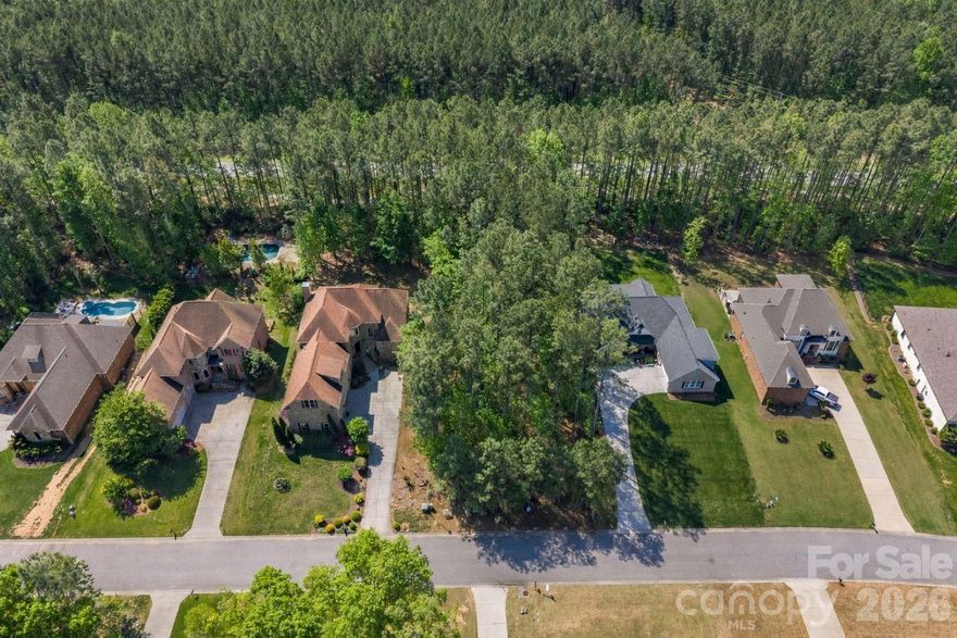 Palm Tree Cove subdivision offers a community pool & walking trails. Build your dream home on this .40 acre lot. A short drive to Allison Creek State Park located on the shores of Lake Wylie. Single story home must be 2400 sq ft min & over of heated living area & 2 story home must be 2600 sq ft min & over of heated living area. County water & sewer. HOA includes boat/rv/jet ski & trailer storage. Award winning Clover schools - inc. new Lake Wylie HS, short driving distance to Charlotte airport, shopping, hospitals, restaurants, trails & low SC property taxes are a big plus!