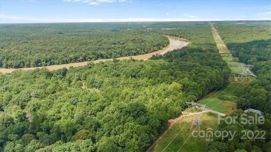**REVISED to include the center tract that contains 3.90 acres. Our clients found out that they inherited this tract making a full 13.90 parcel**
Build your DREAM HOME on the river in the Indian Land School District! This property backs up to the Catawba River and is located in the popular and growing area of Indian Land near shops, restaurants, and entertainment. Seller is open to subdividing if buyer prefers. Five acre parcel: 3817260