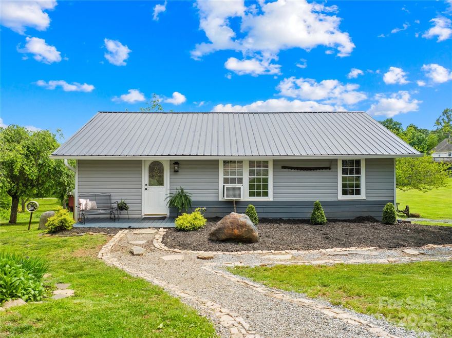 Nestled in a convenient location just under 20 minutes to all that both downtown Weaverville and Asheville have to offer, this cozy 1950 1BR country cottage, with potential to be 2BR like originally, is the perfect opportunity to own a piece of mountain charm and and full of potential to make it your own! Sitting on a spacious ¾-acre lot with a spacious back deck with two interior access points from dining area and primary BR, possibilities are endless for your outdoor aspirations whether you dream of entertaining, building a garden and farming oasis, adding a workshop, creating a play area, or expanding the home, there's room to bring your vision to life! Whether you're a first time home buyer, looking for your part time mountain get away or looking to invest, this property has something for every one. PRICE IMPROVEMENT MORE THAN COVERS INSPECTION FINDINGS. CALL FOR SPECIFICS/REPORT TO REVEAL ALL KNOWN MATERIAL FACTS.