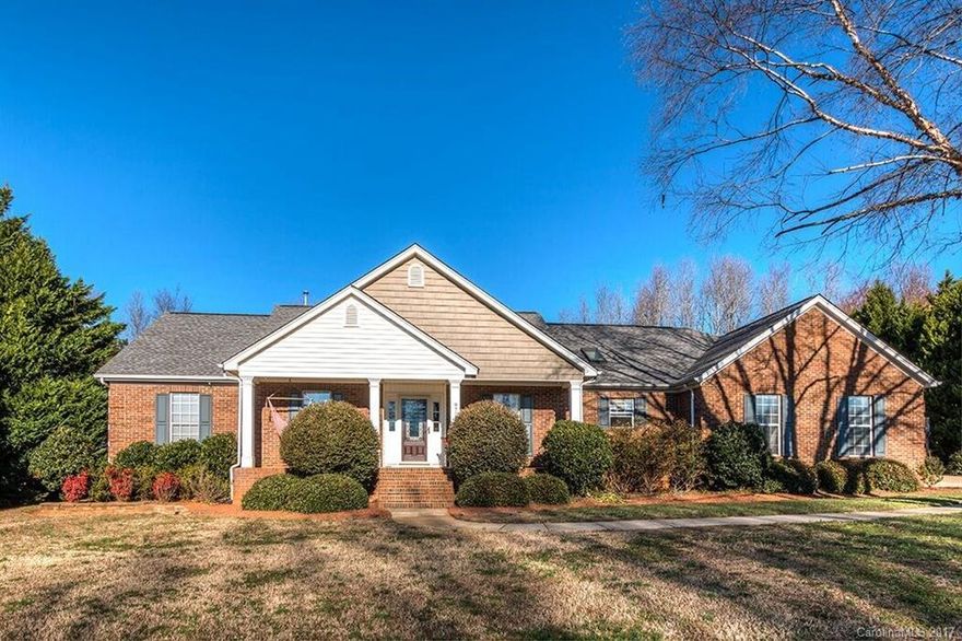 Rare find Full brick ranch in well established neighborhood just mins to 485! 3BR 2 BA w/huge bonus room or 4th BR, in-ground pool w/pool house, w/covered bar, huge deck, hot tub (sold as is) screen porch w/gas F/P. Granite and Hwd floors in KT, SS appliances, new roof, hot water heater 12, pool liner & AC compressor in 13, pool pump 14, DR w beautiful tile work. Rocking chair front porch, 1 car garage, 2 car carport, large lot .70 acre, fenced yard. No HOA, (voluntary for the front entrance)