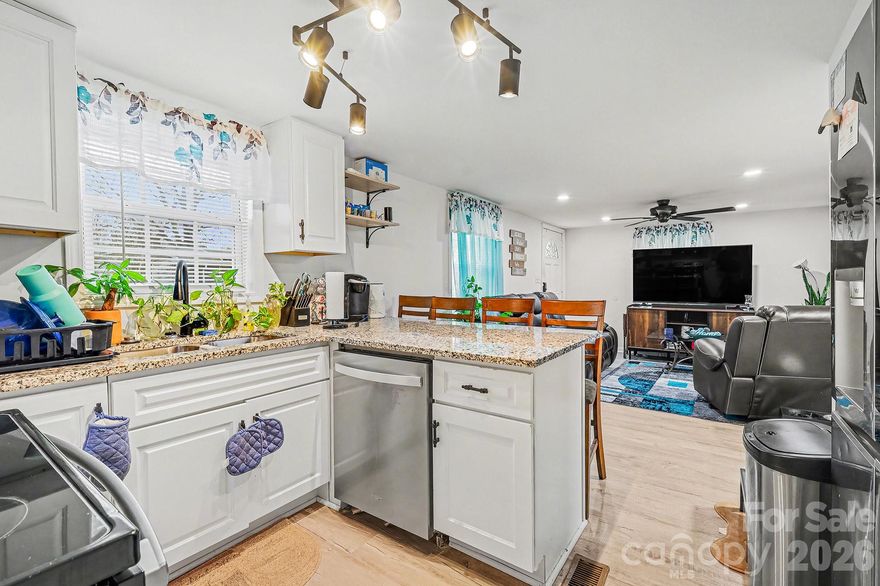 ***$5,000 Lender Credit available when you get approved with Preferred Lender*** Welcome to wonderful, cozy, comfortable living just minutes from downtown Marshville. This home is located just minutes from the 74 Bypass that can get you to Charlotte City limits, Wingate, and Monroe within a respectable time. This all brick ranch home sits in a quiet non HOA cul-de-sac. The property features a low maintenance yard, a carport, a storage shed, great curb appeal, and a cozy front porch. The home was remodeled in 2023 and features an open floor plan neutral paint, LVP flooring, an eat in kitchen peninsula with granite countertops, a pantry, hall laundry, two spacious bedrooms, one bath, and a three season room.