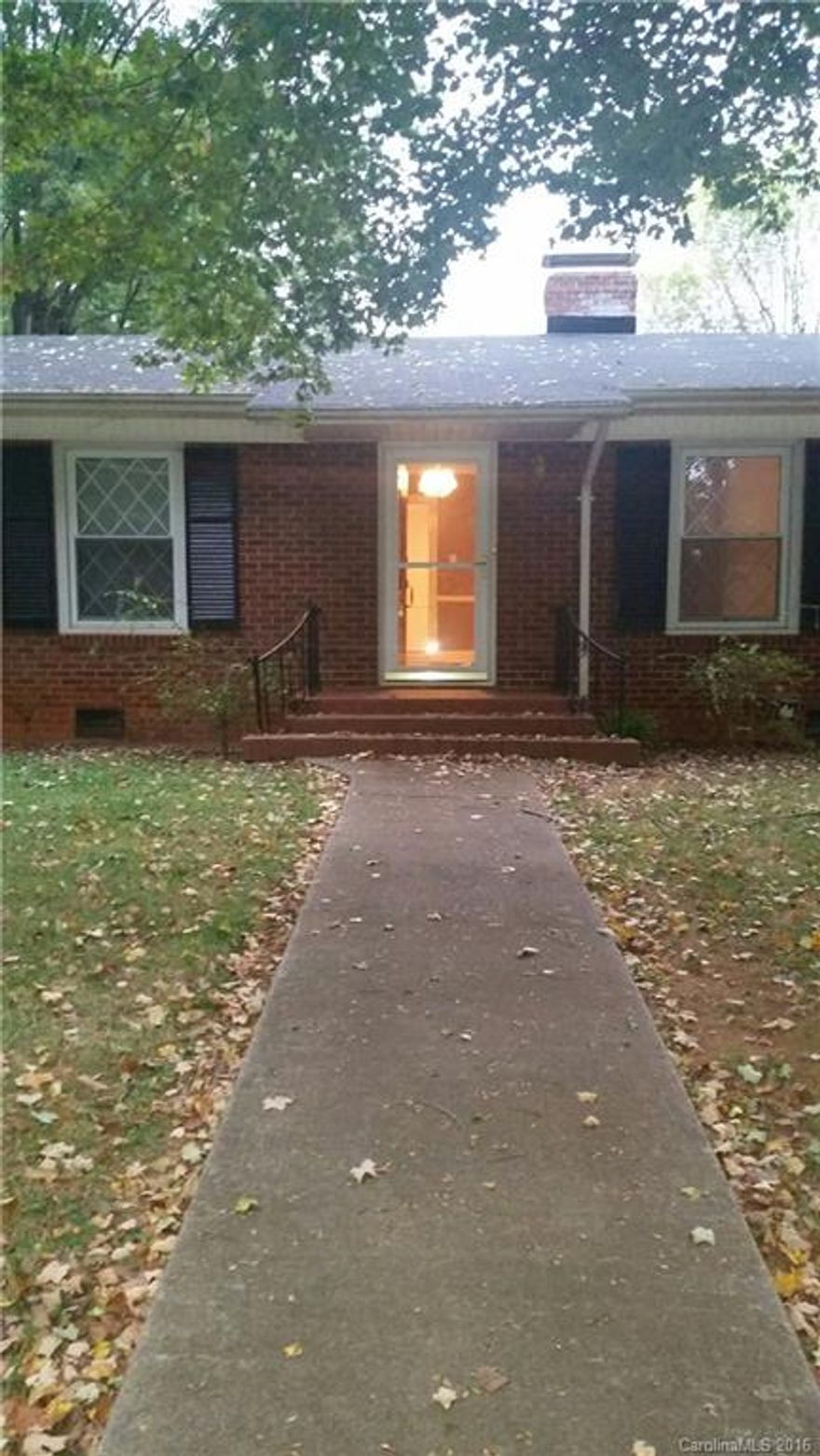 Lovely 3 (or 4) bedroom 1.5 bath ranch home on half acre lot in desirable neighborhood. Game room could be fourth bedroom. Two fireplaces: one gas, one wood burning. Original hardwood floors. Large living room & dining room combination. Fantastic location - walk to the park, Mitchell Community College & other historic downtown amenities. Partially fenced in yard. Pets negotiable. No large breeds. This is a non-smoking residence. Workshop or small garage in backyard. Call owner for appointment.