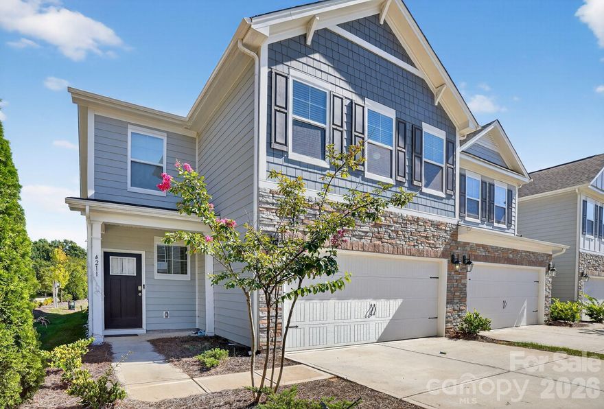 End-unit townhome at the front of Avondale, offering both privacy and convenience. Open-concept layout with abundant natural light, a modern kitchen with granite countertops, stainless steel appliances, and a spacious island. Main-level bedroom with nearby full bath plus upstairs primary suite with separate tub/shower, three additional bedrooms, and a large flex space. Resort-style amenities include a pool, clubhouse, fitness center, pickleball, and bocce courts—close to Ballantyne, shopping, dining, and award-winning schools. Recently built 2023 all appliances and systems 2 years old