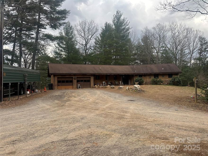 Discover this custom-built home with a unique layout, offering 4 bedrooms and 2.5 baths on a private, wooded lot. Enjoy main-level living with beautiful hardwood floors and custom cabinetry. The full, unfinished basement provides endless possibilities for storage or future expansion. Recently updated this home is conveniently located just minutes from Asheville. Don’t miss this rare opportunity schedule your showing today!