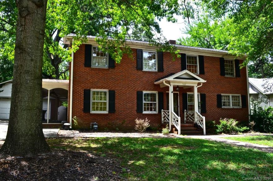 Brick colonial home in Historic District. Hardwood flooring, library, beautiful sunroom overlooks private rear yard. Large master bedroom w/large private bath & walk-in closet. Seller has recently installed new deck. One year home warranty.  seller formerly related to list agent  ATTENTION: BACK ON THE MARKET, BUYERS HOME FELL THROUGH. SELLER JUST INSTALLED BRAND NEW HVAC SYSTEM
