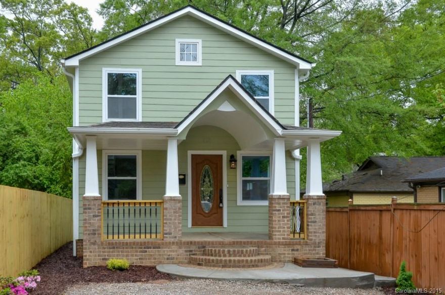 Beautifully Renovated Home in NODA. This charming home has a fully Renovated Kitchen w/granite, Stainless appliances and Tile floors.  Dining room & Living room have hardwood floors and wainscoting.  Original hardwood floors upstairs w/2 Master bedrooms, each shower/tub has tile surround.  Exterior has hardboard siding, replacement windows, gutters and a rocking chair front porch.  Walk to all the NoDa restaurants, live music venues and shops and future light rail station on 36th street.