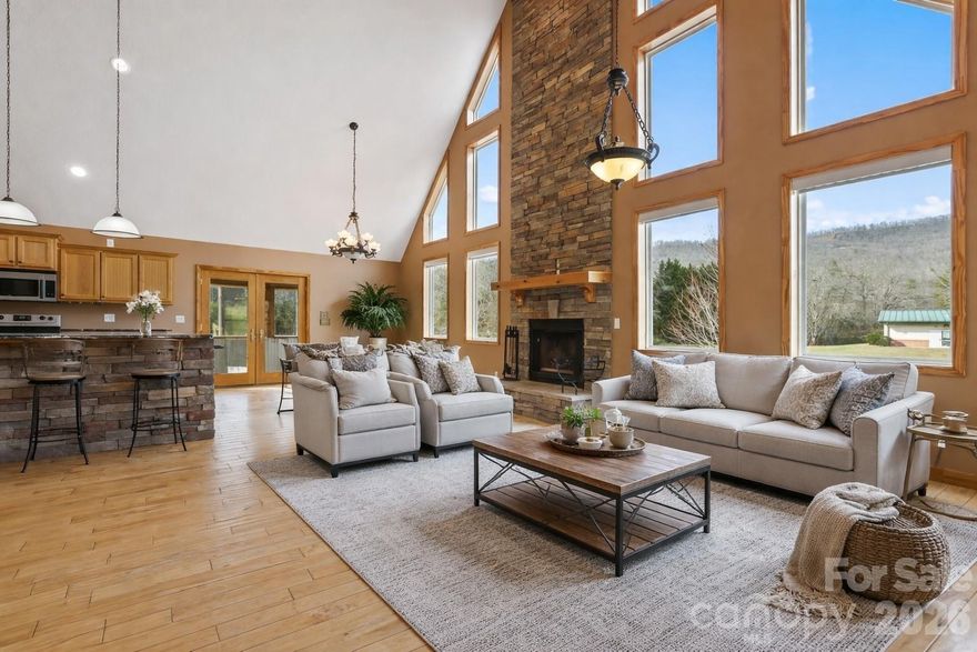 Rare VA Assumable Loan Opportunity at 3.875%! Discover the perfect blend of privacy, flexibility, and convenience at 40 Forge Valley Drive in Mills River. Situated on a level, fully fenced 1.3-acre lot with no restrictions, this property offers endless possibilities for full-time living, multi-generational use, or investment potential. Conveniently located in Mills River, you’re close to shopping, dining, breweries, and major routes while still enjoying a peaceful, country feel. Less than 20 minutes to downtown Brevard, Hendersonville, or Airport Road area in South Asheville!
The home features a separate basement entrance, ideal for a potential mother-in-law suite, guest space, or private living area. Outside, the expansive yard provides ample room for gardening, pets, recreation, or future improvements—made even more appealing by the freedom of unrestricted land use.
Solar panels are already installed, providing energy efficiency and long-term savings.