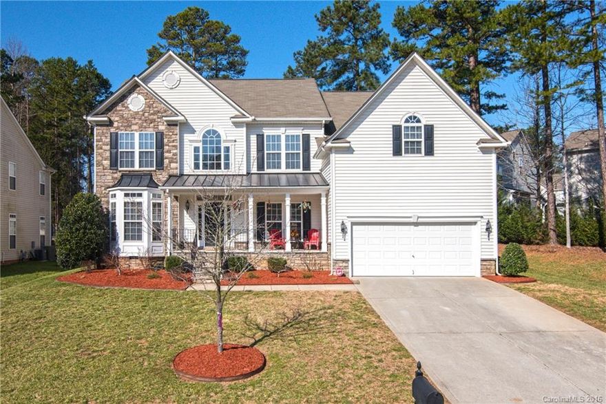 Drive up and say Wow!! Gorgeous home loaded with upgrades -  French doors, Double bay windows, Architectural columns, moldings, stone fireplace, Chef's kitchen w/huge island with glass cabinets, double ovens, tile backsplash, recessed lights, walk in pantry and huge Sunroom. Mud room off garage, Grand dual staircase, h/woods in hallway, Spacious Master suite with trey ceiling, Spa like master bath. Step up Bonus room and large bedrooms. Deck/fenced backyard. Top rated Cabarrus schools.