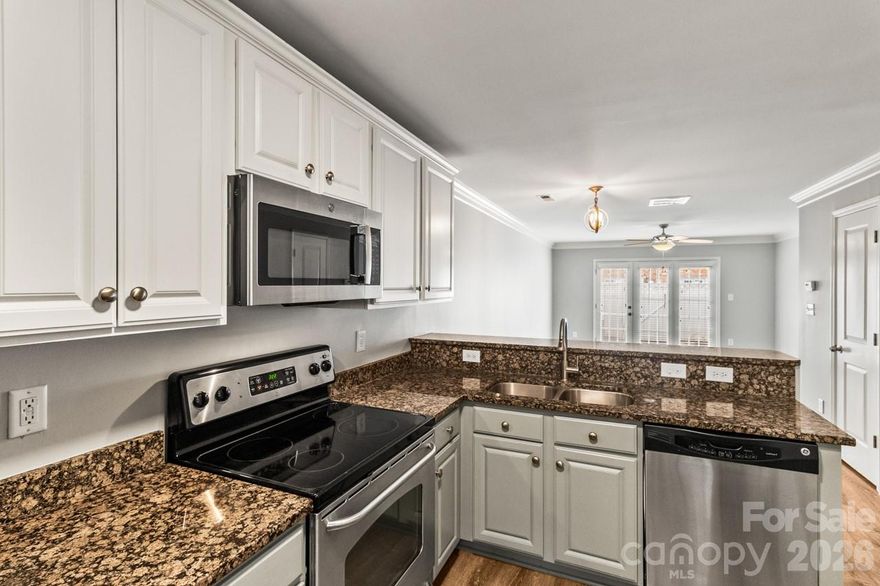 This exceptional end unit condo has been freshly painted with brand new carpet and is ready for immediate move in! End unit living provides added privacy and the layout of the unit that feels more like a townhome than a traditional condo.
The main level features an open floor plan with durable luxury vinyl plank flooring throughout and a kitchen designed for both function and style. Granite countertops, stainless steel appliances, abundant cabinetry, and a breakfast bar flow seamlessly into the living and dining areas, making everyday living and entertaining effortless.
French doors open to a private, fully fenced patio with 6-foot white vinyl fencing which is perfect for morning coffee, weekend BBQs, or evening gatherings with friends and family.
Upstairs, the primary bedroom is bright and airy, with large windows that fill the space with natural light. Conveniently located near the laundry closet, it offers a comfortable retreat at the end of the day. The hall bath includes a shower/tub combination, and the secondary bedroom is flexible for use as a guest room, home office, or additional living space.
Located less than a mile from the heart of Plaza Midwood, this condo offers quick access to restaurants, shops, parks, nightlife, Uptown, Chantilly, and NoDa. Rare end-unit availability in this community makes this a standout opportunity for move-in ready Charlotte living!