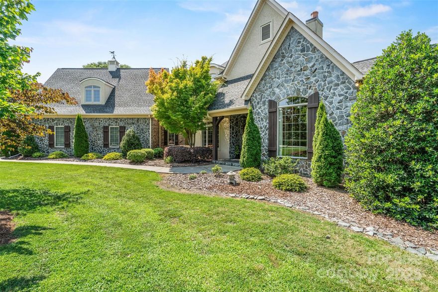 Like New / Immaculately maintained 4BR/3BA/2HB home on 1+ acre in desirable Indian Land Schools. Over 4,200 sq ft featuring tall ceilings, 2-story family room with library overlook, formal dining, office, and chef’s kitchen with 48” Dacor dual-fuel range & built-in under-counter ice maker. Main-level primary suite with soaking tub, separate shower, & covered veranda access. Jack & Jill bath connects two large upstairs bedrooms. In-law suite above oversized garage includes full bath w/ walk-in tub, kitchenette, and lift-ready stair access. Custom saltwater pool & hot tub (pool furniture incl), covered veranda, screened morning porch (furniture incl), fenced yard, and privacy landscaping. Garage has workshop space, additional fridge, and utility sink. Outdoor pool storage with additional fridge under covered deck. Gas logs, central vac, audio and sprinkler systems. Minutes to Indian Land shopping; 30 mins to Rock Hill; <1 hour to Uptown Charlotte.