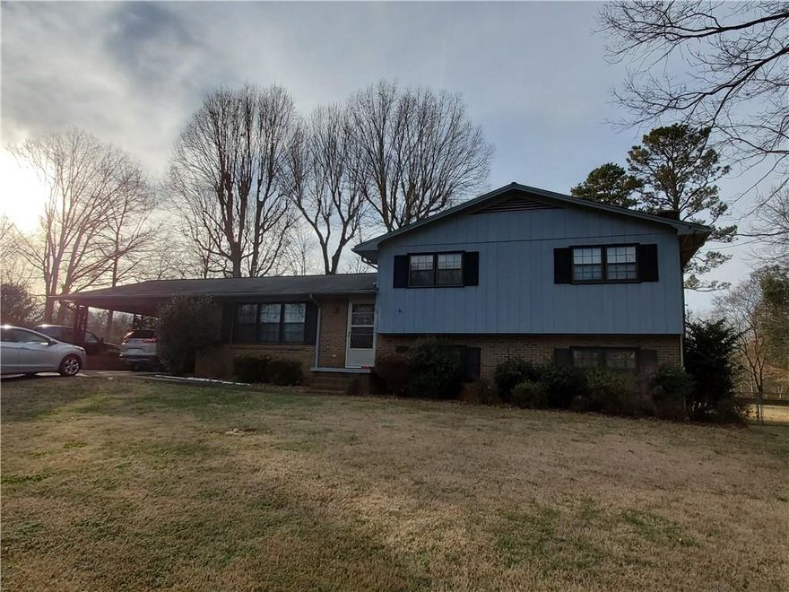 SPACIOUS AND AFFORDABLE!!   This generously sized split level is conveniently located in a well maintained neighborhood. It offers a fenced yard, large workshop with 100 amps of power, and an additional storage shed.  The back yard is the perfect place for pets or a play area.  This home does need some repairs and updates but with some TLC it can be your opportunity to add your personal touch.  As an added bonus this seller is including the refrigerator and the nearly new HE washer and dryer.