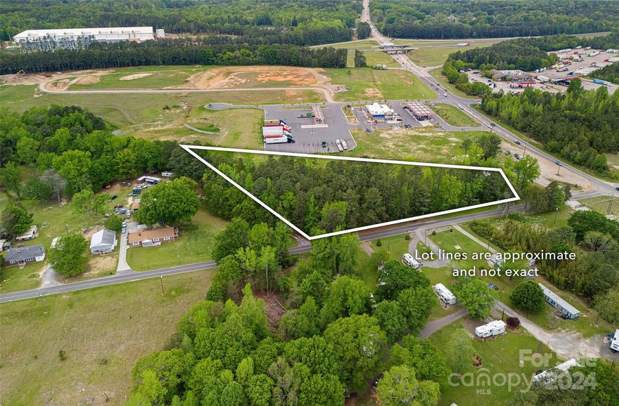 Approximate 1.60 acre lot that is zoned RUD/RUD1. Just off of I77 behind the Scotchman Travel Plaza at 2454 Mt Holly Rd, Rock Hill. Well and septic are needed.