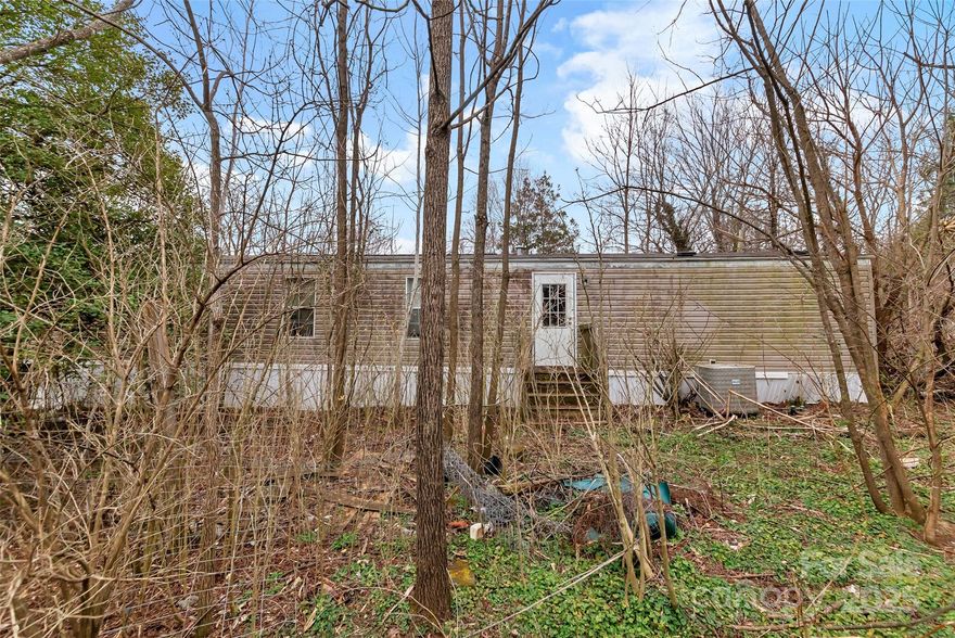 Investors Delight!  Bring all offers! Exciting prospects await you in the charming Black Mountain! This property, a unique singlewide, is brimming with potential and is situated on about .23 acres of level land, perfect for transforming into your dream home. Enjoy a fantastic location just moments from downtown and the stunning trails of Montreat, making it an ideal spot for outdoor adventures and convenient living. This home has not been lived in for several years.

Property sold via special proceeding pursuant to NCGS. Sold in As Is condition. All offers subject to statutory upset bid period. Property will be conveyed by special warranty deed.