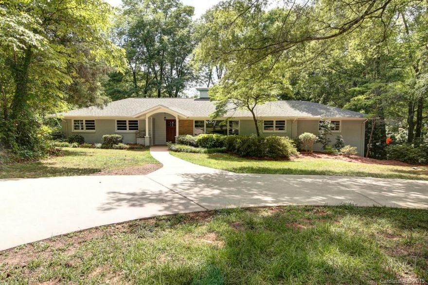 Spacious ranch on huge corner lot with both front circular driveway and driveway to rear-load garage. Updated with open floor plan, new kitchen, baths, HVAC, hardwoods and tile throughout. Fabulous great room over lower level garage is light-filled and a treat to show. Plenty of outdoor living area with large deck off kitchen and patio area below. Minutes to Uptown and South Park. Welcome to your new home.