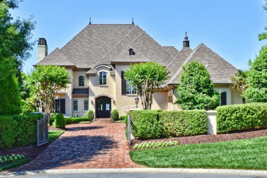 French Prov. Arcadia custom home-style & sophistication! Water & Fairway views fr every window! Flowing fl plan: Library w/spiral strcase, LR/DR wFP & architectural details. Chef's kitchen w/prof grade ss appl, wine cellar. Luxury mstr suite, 4 add'l bdrm en suite. LL: bar, billiards, entertainment area-walkout to outdoor fp & kitchen. Covered terraces, saltwater pool/infinity edge, spa & pool cabana. 3 lvls resort living at its finest! Link to the drone video:  http://vimeo.com/128114596