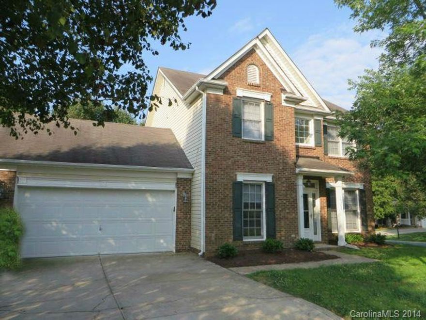 This home has lots to offer including a great price! 2 story brick front on corner lot w/ mature shade trees & landscaping.  HWs in formal DR, LR & Kitchen. Lots of fresh paint throughout. Great Room w/ FP opens to large eat-in Kitchen w/ bayed Breakfast area, tons of cabinet space & handy center island w/ tile top . Smooth cooktop range. Nice moldings in formal areas. Master BR has tray ceiling & bath w/garden tub, sep shower, dual sinks & deep WIC.  Two nice-sized secondary BRs. AC 2012.