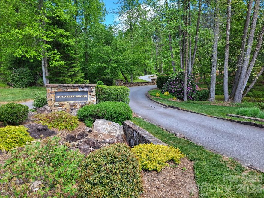 Beautiful, expansive 5.68-acre lot nestled in the highly sought-after Mountain Brook subdivision. This private, secluded property offers the perfect blend of peaceful mountain living and everyday convenience, just a few miles from downtown Brevard. Enjoy easy access to local amenities, including nearby schools and the racquet club, all while being surrounded by the natural beauty of the mountains. Outdoor enthusiasts will love the close proximity to hiking trails, trout fishing spots, biking routes, and scenic river activities. This tranquil property is an ideal setting to build your mountain retreat while staying connected to everything the area has to offer.