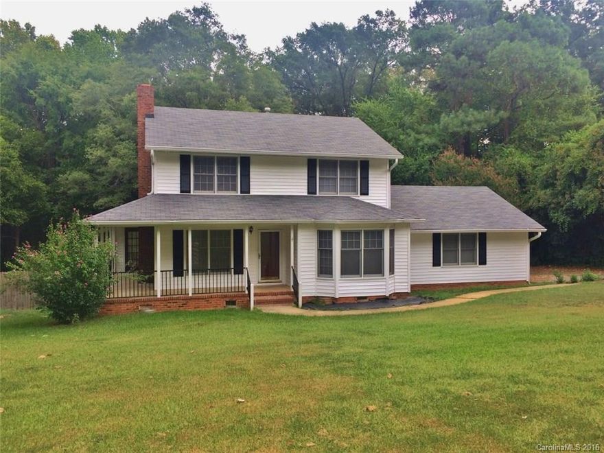 Roof, heating & air replace 2013. Vinyl siding new. Kitchen with breakfast bar & lots of cabinets. Opens to great room with fireplace. Sun room with ½ bath. And living room or dining room. All downstairs. 3 bedrooms, 2 baths upstairs. Large fenced rear yard. Covered front porch. Great location! Property is being sold "AS IS".