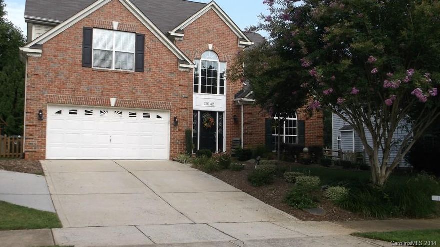 Immaculate home! New plank wood floors throughout. Ceramic tile in bathrooms. Custom Hickory vanity & copper sink in half bath. Large open kitchen w/Corian countertops, SS appliances, custom tile backsplash & custom stone accent on front of island. 2 sty greatroom, arched doorways. Master on main level w/deluxe master bath. 5 bdrm, 3 full bath. Bdrm #3 upstairs has private full bath. Tons of storage. Fantastic screened in porch & deck overlooks private bkyd. Visitor docks provide access to lake.