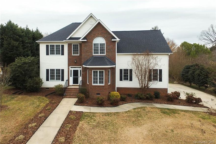 Beautifully maintained four bedroom home. Bonus room is fourth bedroom with walk in closet. All new interior paint. New carpeting up stairs, wood floors first floor. Quaint neighborhood. Solid surface counter tops. Double oven and a Jenn-Air gas range. Laundry on second floor. New Hybrid heat pump/gas pack HV/AC system installed in 2010. New roof in 2010. Gas grill hook-up at back patio, by the in-ground salt water pool. Pool has new liner installed in 2016. Nearly half acre and close to I-77.