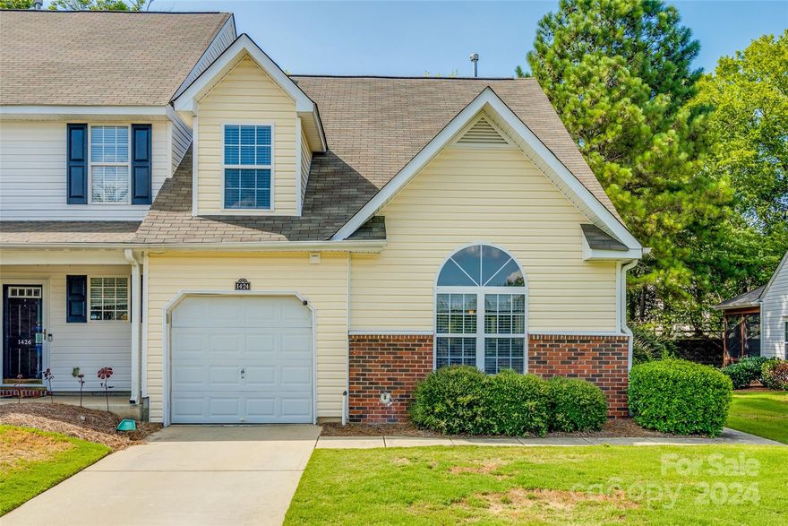 Rates have dropped! Take a look at this townhouse in Lexington Commons! Not only is the primary on the main, it's an end unit and it has a garage! Beautiful new LVP floors in the main areas, stainless steel appliances and granite countertops in the kitchen. HVAC and furnace replaced in 2023. New hot water heater 2022. Convenient to I-77, shopping and grocery stores close by.