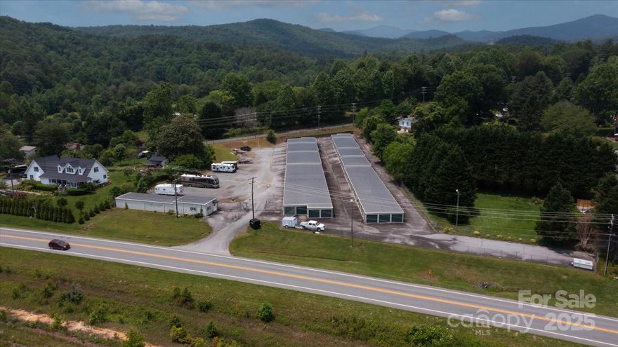 ***UNDER CONTRACT WITH A 10 DAY UPSET BID PERIOD. PLEASE CONTACT THE CLERK OF COURT FOR TRANSYLVANIA COUNTY FOR CURRENT BID AND TO FIND OUT MORE INFO ON SUBMITTING A BID***. Welcome to an exceptional investment opportunity in the heart of scenic Western North Carolina! This storage facility in Pisgah Forest features 163 units & 14 dedicated parking spaces for boats, RVs, & trailers - a rare & in-demand amenity in the region. Perfectly situated for convenience & growth, the facility is just 3 minutes to Etowah, 9 minutes to the entrance of Pisgah National Forest, & 15 minutes to Mills River. Whether serving outdoor enthusiasts heading into the mountains or locals needing reliable storage, this property offers significant potential for expansion & increased revenue. With rising demand for storage solutions in this rapidly growing area, investors have a unique chance to scale operations, add services, or enhance current infrastructure.