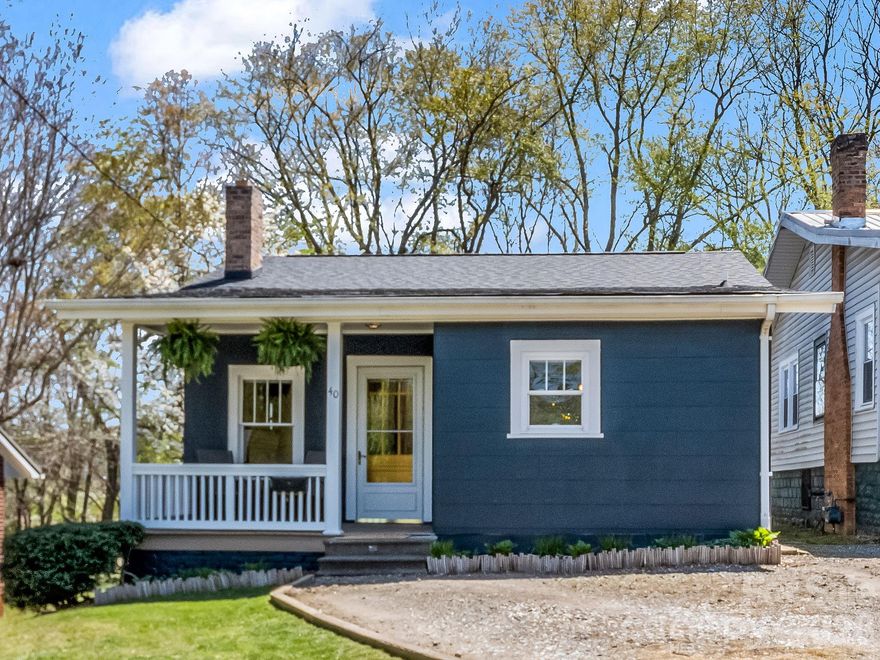Charming 1920s bungalow in the heart of West Asheville! Just a few blocks from Haywood Road, 40 Hudson offers an unbeatable location close to neighborhood favorites like Sunny Point Cafe, Botiwalla, The Oyster House Brewing Company, Standard Pizza Co., and Dobra Tea. This impeccably maintained 2-bedroom, 2-bath, one-level home blends timeless character with thoughtful modern updates. Inside, a light-filled floor plan showcases original heart-of-pine floors and wide baseboards. The updated kitchen offers ample storage, a large pantry, and easy access to a convenient laundry/mudroom. Both bedrooms are generously sized, with two full baths for comfortable living, and big closets. A plus! Enjoy morning coffee or tea on the inviting covered front porch, or spend time on the spacious back deck overlooking a level backyard—ideal for gardening, entertaining, and play.  Set back from the road, the property also features off-street parking for 2–3 vehicles, adding to its everyday convenience. A newly encapsulated crawl space with a dehumidifier offers extra storage space. Please see the document with the complete list of upgrades. A rare opportunity to own a move-in-ready classic bungalow in one of Asheville’s most sought-after neighborhoods!